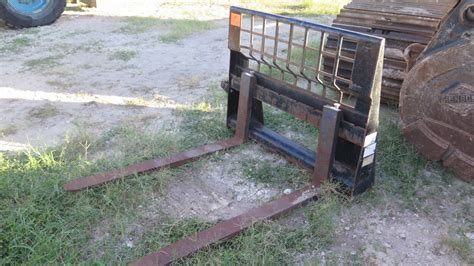 cat skid steer with fork lift|used skid steer pallet forks.